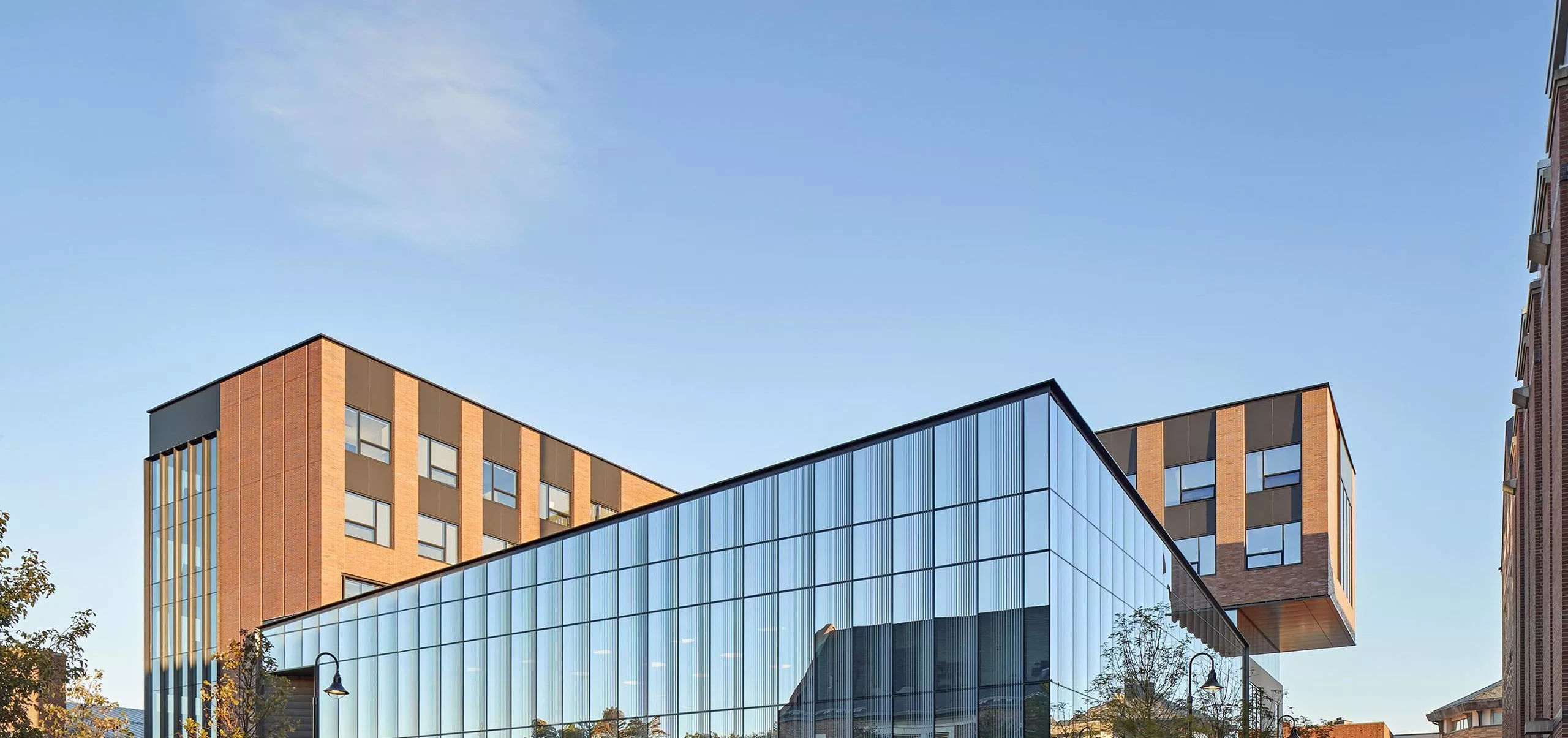 Innovation Studio & Messenger Residence Hall building with large glass windows